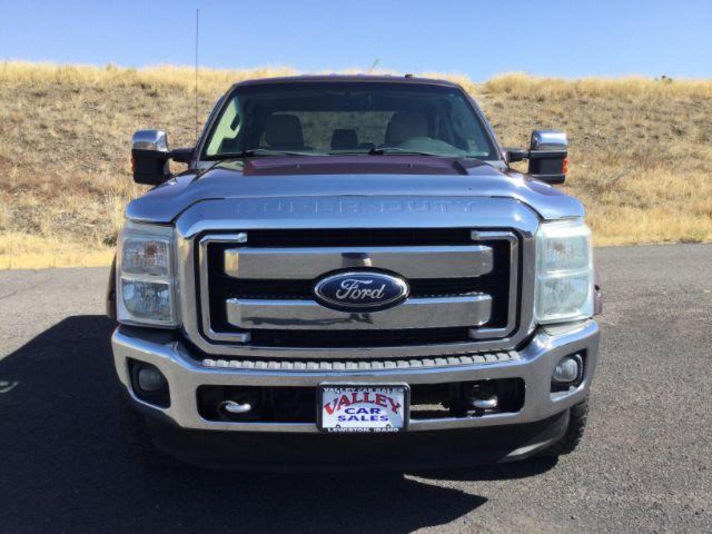 2011 Royal Red Metallic /Adobe Cloth Interior Ford F-350 SD XLT Crew Cab 4WD (1FT8W3BT8BE) with an 6.7L V8 OHV 16V DIESEL engine, 6-Speed Automatic transmission, located at 1801 Main Street, Lewiston, 83501, (208) 743-9371, 46.417065, -117.004799 - Photo#11