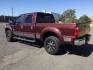 2011 Royal Red Metallic /Adobe Cloth Interior Ford F-350 SD XLT Crew Cab 4WD (1FT8W3BT8BE) with an 6.7L V8 OHV 16V DIESEL engine, 6-Speed Automatic transmission, located at 1801 Main Street, Lewiston, 83501, (208) 743-9371, 46.417065, -117.004799 - Photo#2