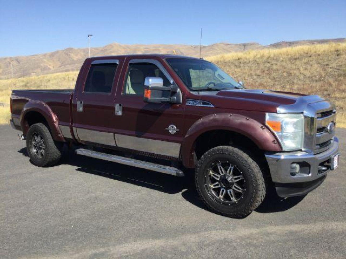 2011 Royal Red Metallic /Adobe Cloth Interior Ford F-350 SD XLT Crew Cab 4WD (1FT8W3BT8BE) with an 6.7L V8 OHV 16V DIESEL engine, 6-Speed Automatic transmission, located at 1801 Main Street, Lewiston, 83501, (208) 743-9371, 46.417065, -117.004799 - Photo#8