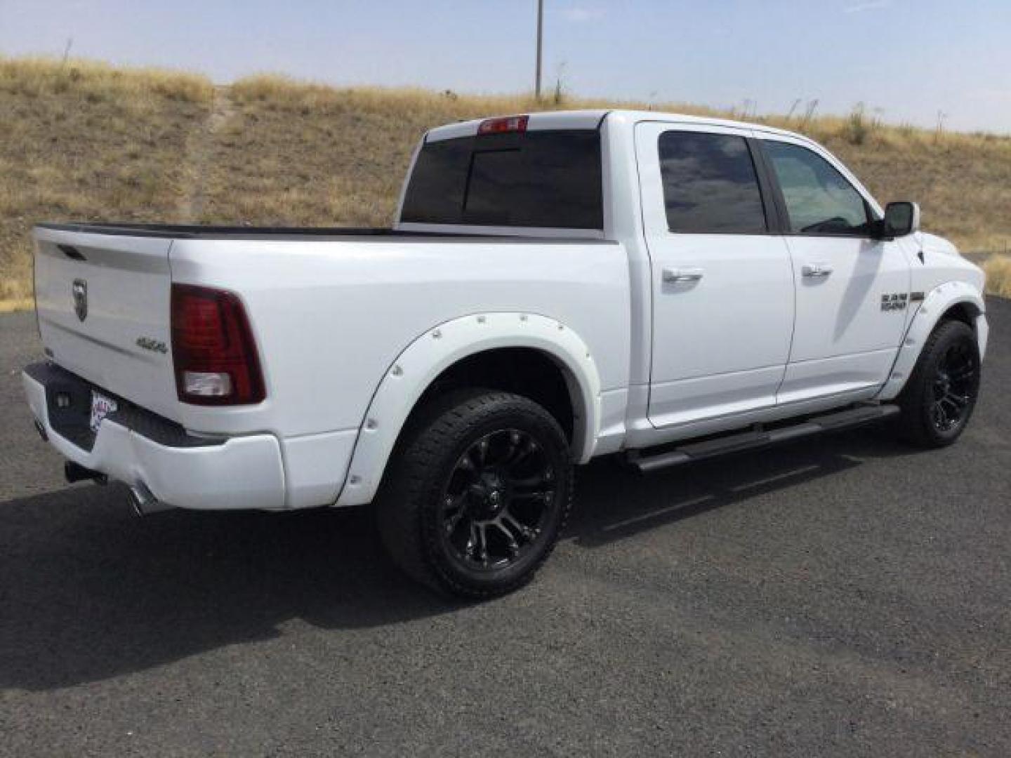 2016 Bright White Clear Coat /Black, leather RAM 1500 Sport Crew Cab SWB 4WD (1C6RR7MT2GS) with an 5.7L V8 OHV 16V engine, 8-Speed Automatic transmission, located at 1801 Main Street, Lewiston, 83501, (208) 743-9371, 46.417065, -117.004799 - Photo#10