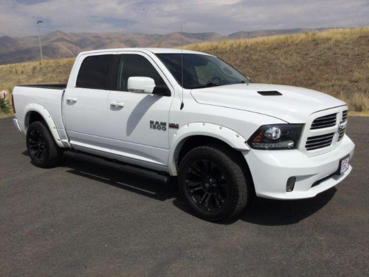 2016 Bright White Clear Coat /Black, leather RAM 1500 Sport Crew Cab SWB 4WD (1C6RR7MT2GS) with an 5.7L V8 OHV 16V engine, 8-Speed Automatic transmission, located at 1801 Main Street, Lewiston, 83501, (208) 743-9371, 46.417065, -117.004799 - Photo#8