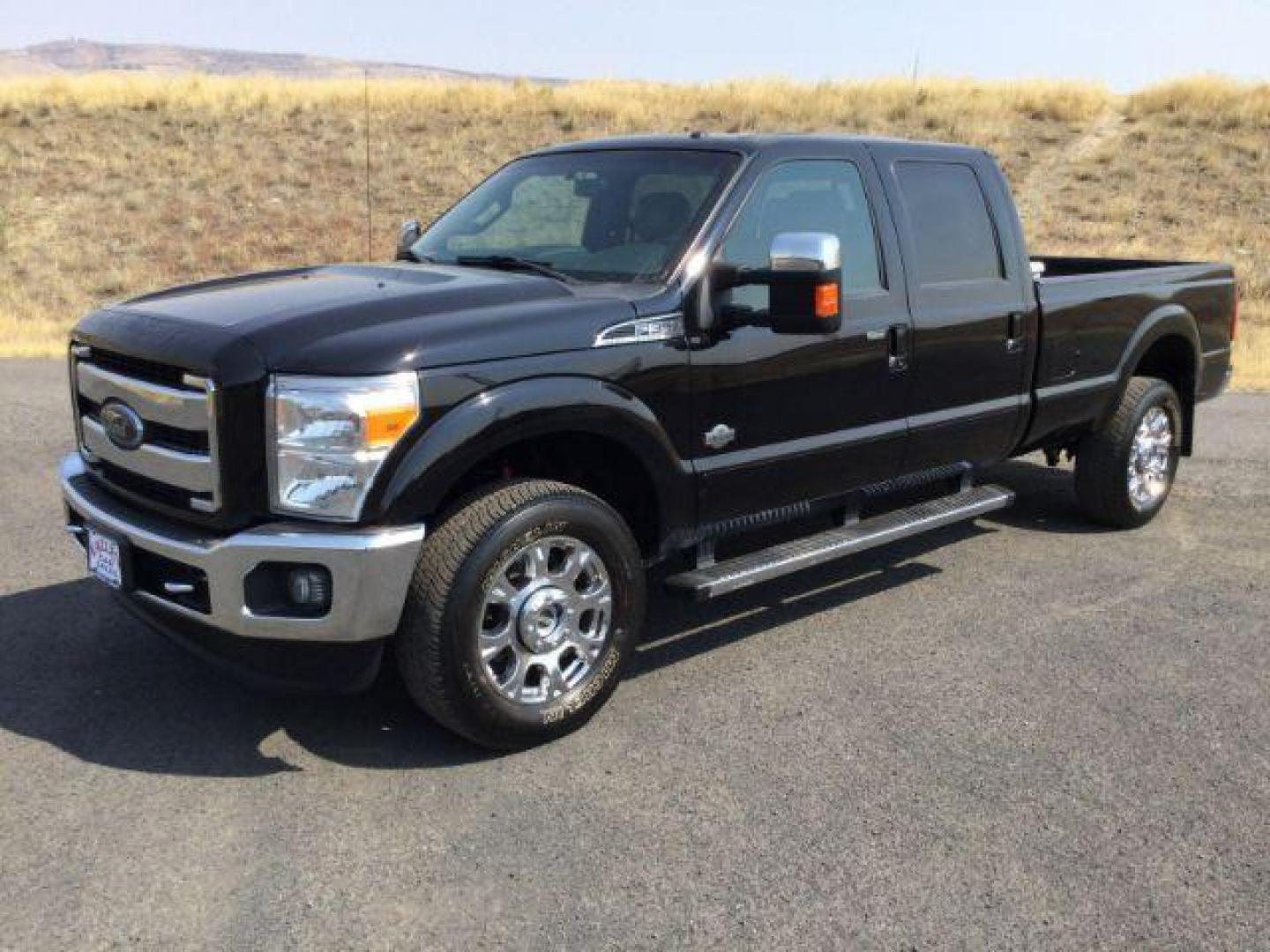 2016 BLACK /King Ranch Brown Leather Seats Ford F-350 SD King Ranch Long Bed Crew 4x4 (1FT8W3BT8GE) with an 6.7L V8 OHV 16V DIESEL engine, 6-Speed Automatic transmission, located at 1801 Main Street, Lewiston, 83501, (208) 743-9371, 46.417065, -117.004799 - Photo#0