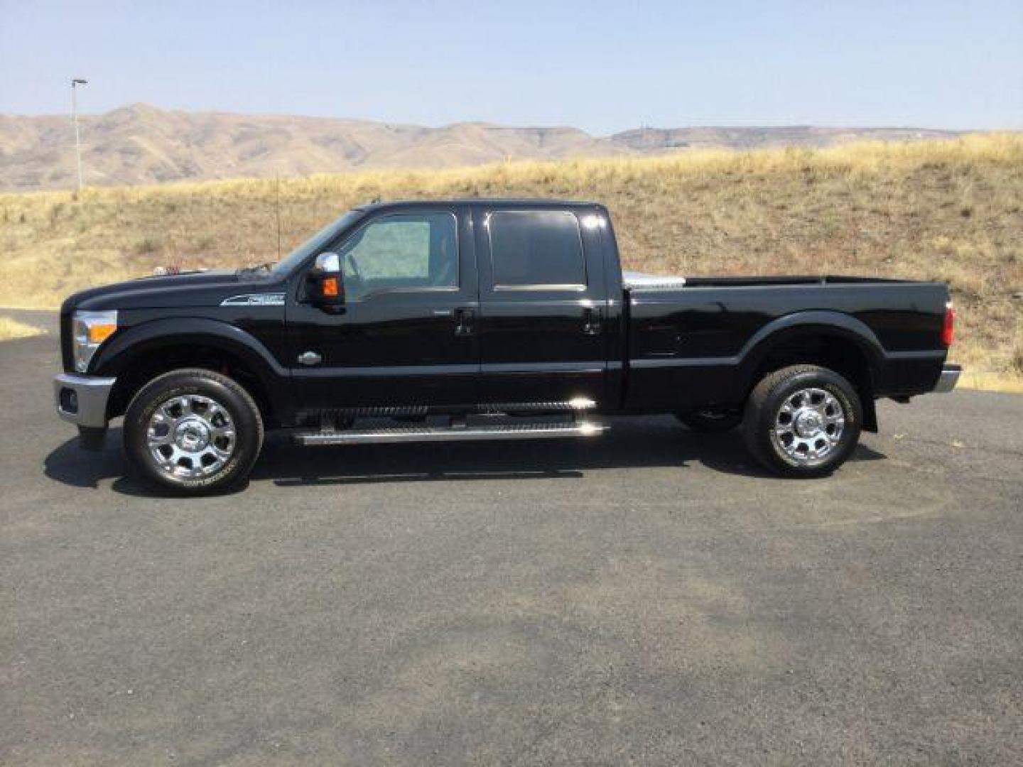 2016 BLACK /King Ranch Brown Leather Seats Ford F-350 SD King Ranch Long Bed Crew 4x4 (1FT8W3BT8GE) with an 6.7L V8 OHV 16V DIESEL engine, 6-Speed Automatic transmission, located at 1801 Main Street, Lewiston, 83501, (208) 743-9371, 46.417065, -117.004799 - Photo#1