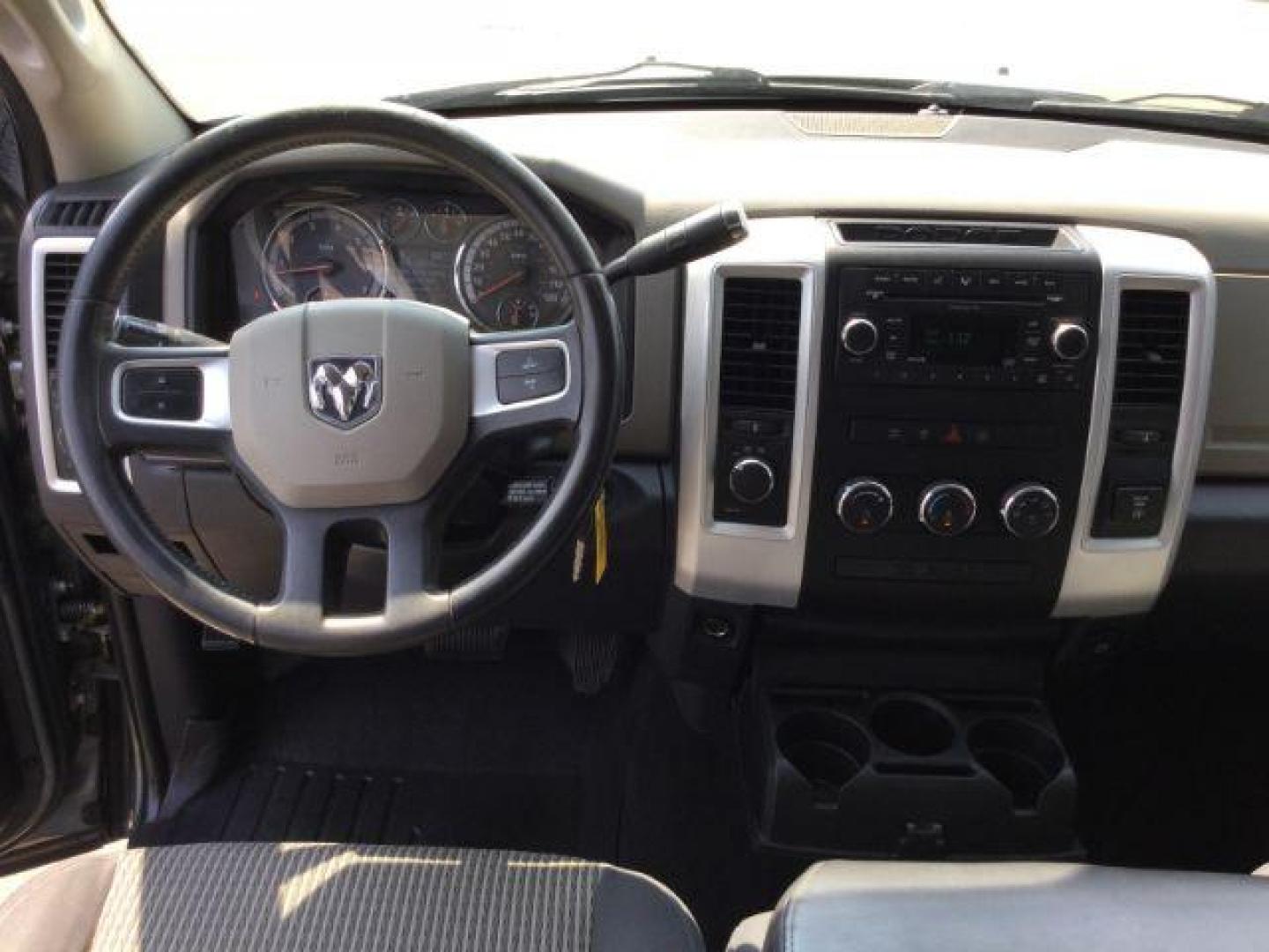 2009 Mineral Gray Metallic /Dark Slate/Medium Graystone Cloth Interior Dodge Ram 1500 SLT Crew Cab 4WD (1D3HV13T39S) with an 5.7L V8 OHV 16V engine, 5-Speed Automatic transmission, located at 1801 Main Street, Lewiston, 83501, (208) 743-9371, 46.417065, -117.004799 - Photo#5