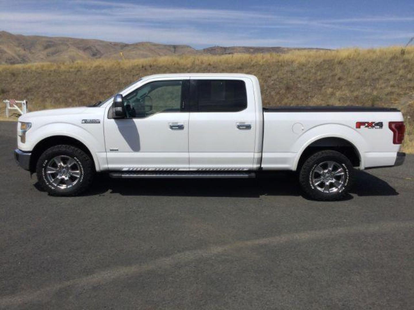 2015 White Platinum Metallic Tri-Coat /GRAY LEATHER Ford F-150 Lariat SuperCrew 6.5-ft. Bed 4WD (1FTFW1EG1FK) with an 3.5 V6 engine, 6-Speed Automatic transmission, located at 1801 Main Street, Lewiston, 83501, (208) 743-9371, 46.417065, -117.004799 - Photo#1