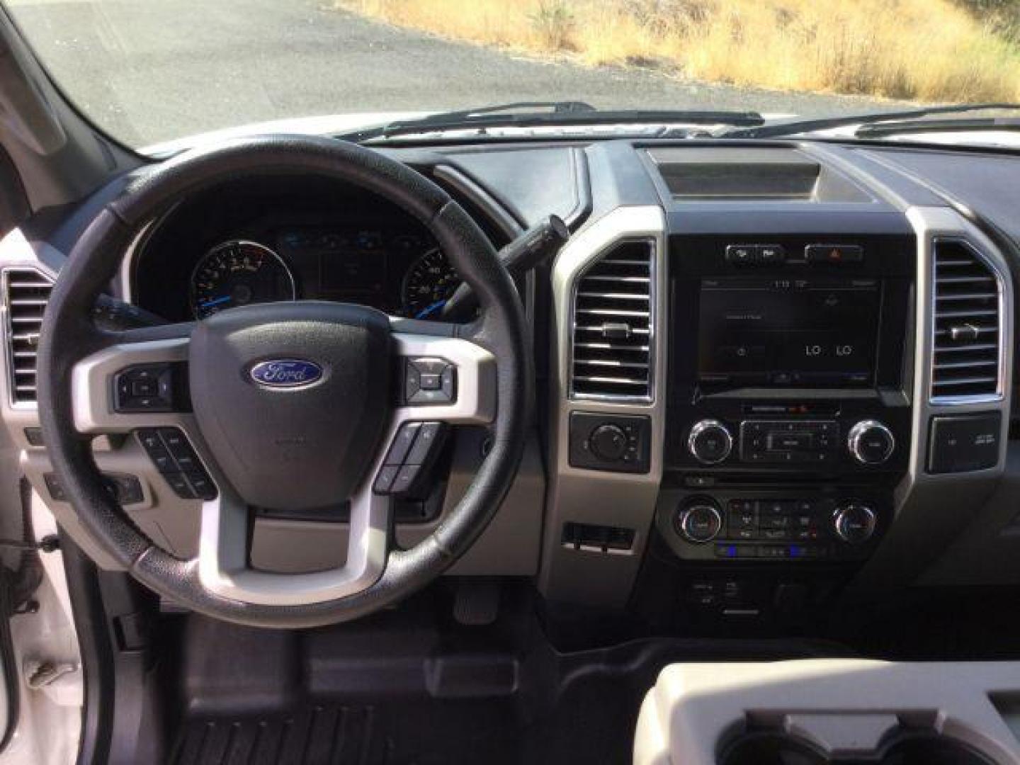 2015 White Platinum Metallic Tri-Coat /GRAY LEATHER Ford F-150 Lariat SuperCrew 6.5-ft. Bed 4WD (1FTFW1EG1FK) with an 3.5 V6 engine, 6-Speed Automatic transmission, located at 1801 Main Street, Lewiston, 83501, (208) 743-9371, 46.417065, -117.004799 - Photo#6