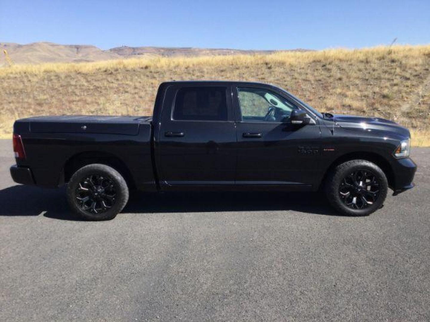 2018 Brilliant Black Crystal Pearl Coat /Black, leather RAM 1500 Sport Crew Cab SWB 4WD (1C6RR7MT8JS) with an 5.7L V8 OHV 16V engine, 8-Speed Automatic transmission, located at 1801 Main Street, Lewiston, 83501, (208) 743-9371, 46.417065, -117.004799 - Photo#9