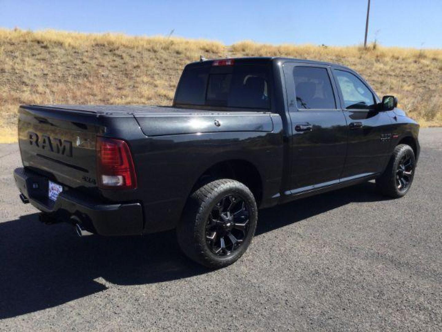 2018 Brilliant Black Crystal Pearl Coat /Black, leather RAM 1500 Sport Crew Cab SWB 4WD (1C6RR7MT8JS) with an 5.7L V8 OHV 16V engine, 8-Speed Automatic transmission, located at 1801 Main Street, Lewiston, 83501, (208) 743-9371, 46.417065, -117.004799 - Photo#10