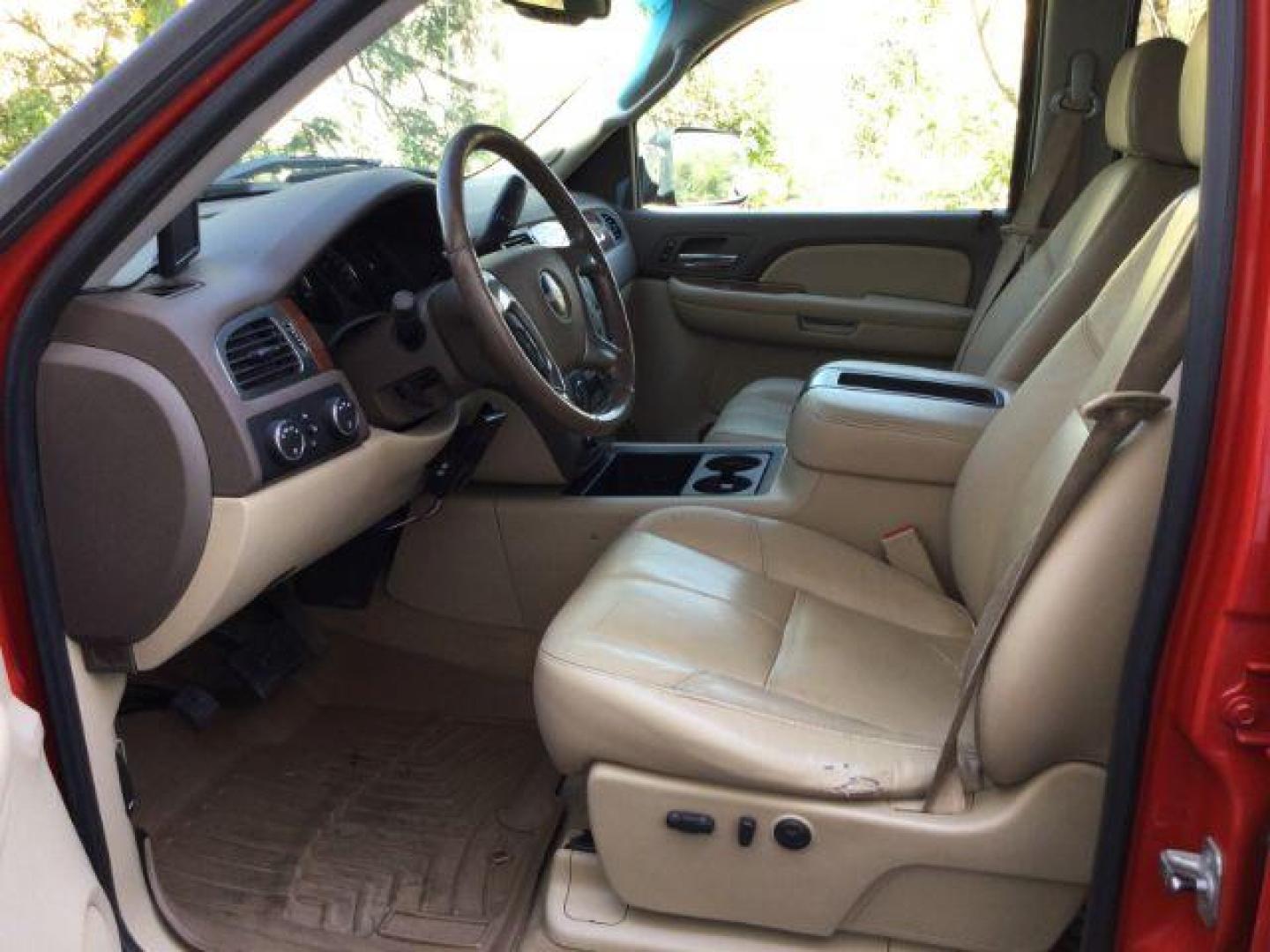 2007 Fire Red /Tan Leather GMC Sierra 2500HD SLE1 Crew Cab 4WD (1GTHK23KX7F) with an 6.0L V8 16V OHV engine, 6-Speed Automatic transmission, located at 1801 Main Street, Lewiston, 83501, (208) 743-9371, 46.417065, -117.004799 - Photo#3