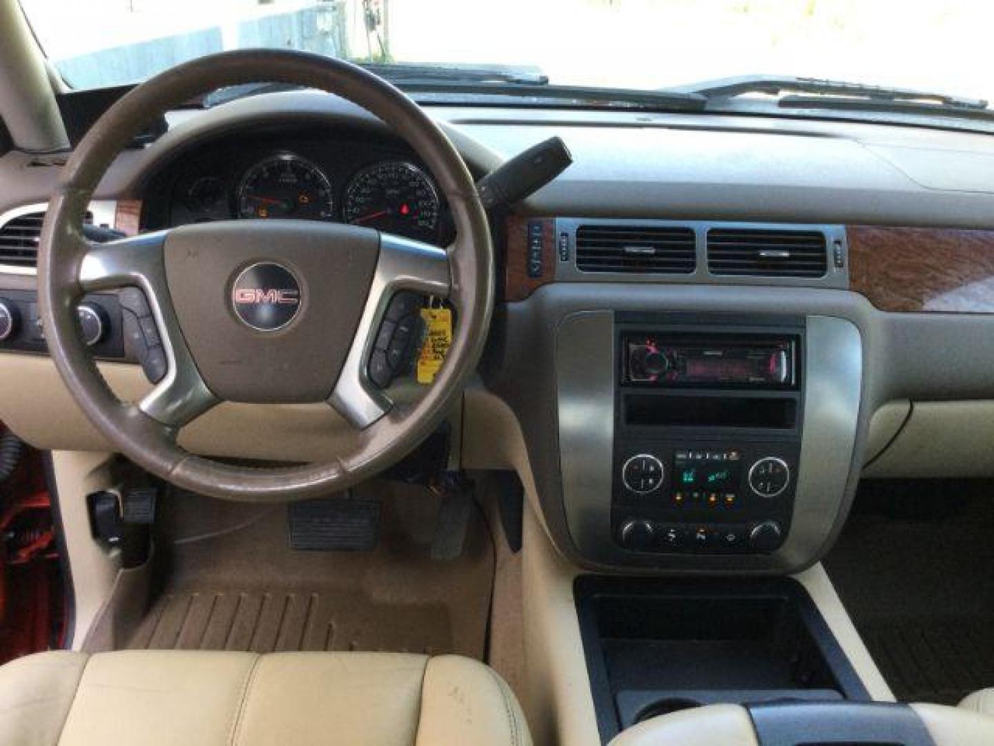 2007 Fire Red /Tan Leather GMC Sierra 2500HD SLE1 Crew Cab 4WD (1GTHK23KX7F) with an 6.0L V8 16V OHV engine, 6-Speed Automatic transmission, located at 1801 Main Street, Lewiston, 83501, (208) 743-9371, 46.417065, -117.004799 - Photo#5