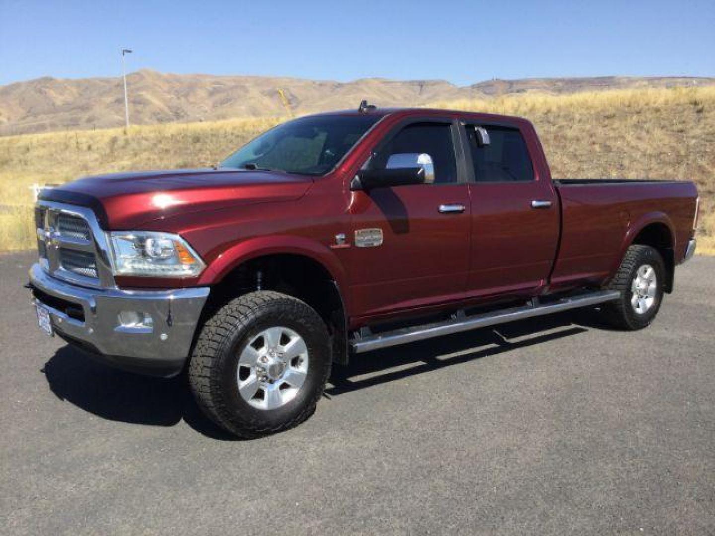 2016 Delmonico Red Pearl Coat /Canyon Brown/Light Frost Beige, premium leather RAM 3500 Longhorn Crew Cab LWB 4WD (3C63R3KLXGG) with an 6.7L L6 OHV 24V TURBO DIESEL engine, 6-Speed Automatic transmission, located at 1801 Main Street, Lewiston, 83501, (208) 743-9371, 46.417065, -117.004799 - Photo#0