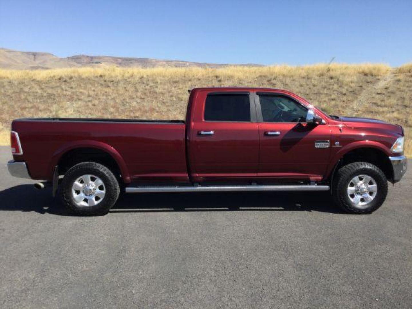 2016 Delmonico Red Pearl Coat /Canyon Brown/Light Frost Beige, premium leather RAM 3500 Longhorn Crew Cab LWB 4WD (3C63R3KLXGG) with an 6.7L L6 OHV 24V TURBO DIESEL engine, 6-Speed Automatic transmission, located at 1801 Main Street, Lewiston, 83501, (208) 743-9371, 46.417065, -117.004799 - Photo#12