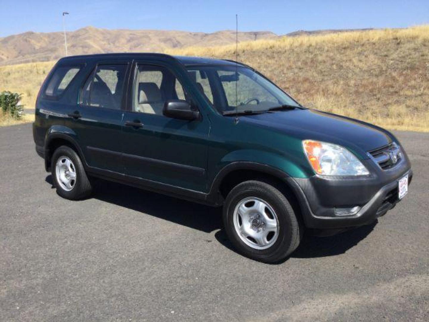 2002 Clover Green Pearl /Saddle Cloth Interior Honda CR-V LX 2WD (JHLRD68422C) with an 2.4L L4 DOHC 16V engine, 4-Speed Automatic transmission, located at 1801 Main Street, Lewiston, 83501, (208) 743-9371, 46.417065, -117.004799 - Photo#9