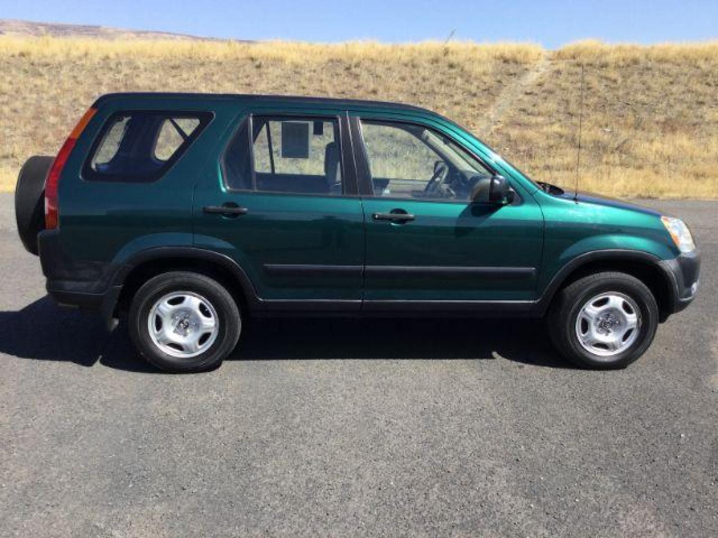 2002 Clover Green Pearl /Saddle Cloth Interior Honda CR-V LX 2WD (JHLRD68422C) with an 2.4L L4 DOHC 16V engine, 4-Speed Automatic transmission, located at 1801 Main Street, Lewiston, 83501, (208) 743-9371, 46.417065, -117.004799 - Photo#10