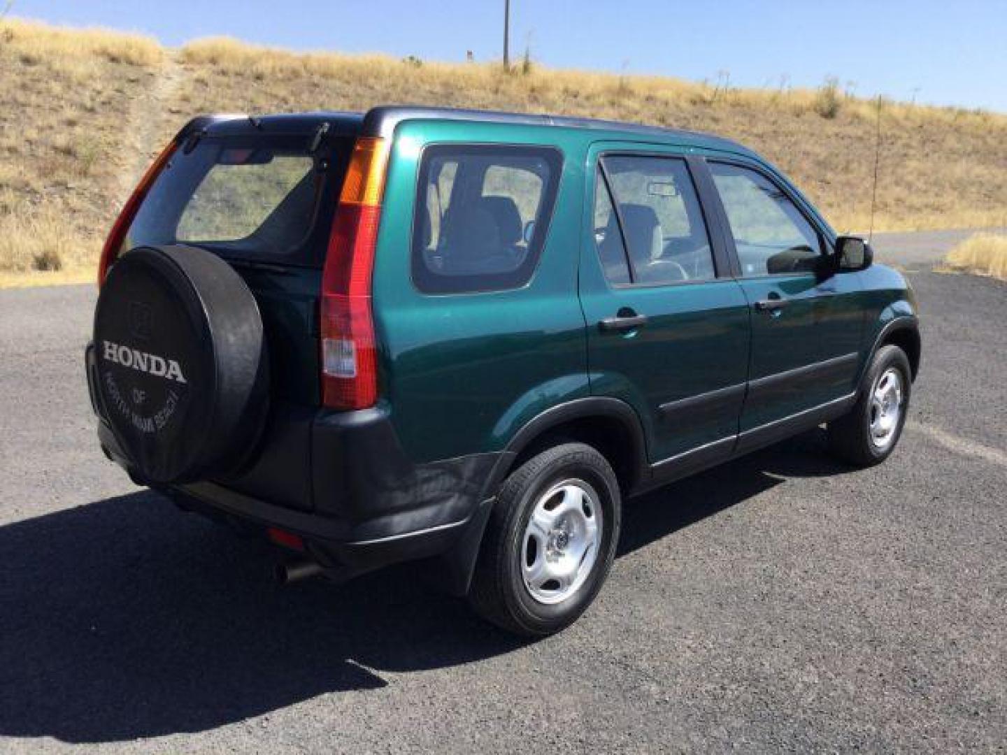 2002 Clover Green Pearl /Saddle Cloth Interior Honda CR-V LX 2WD (JHLRD68422C) with an 2.4L L4 DOHC 16V engine, 4-Speed Automatic transmission, located at 1801 Main Street, Lewiston, 83501, (208) 743-9371, 46.417065, -117.004799 - Photo#11