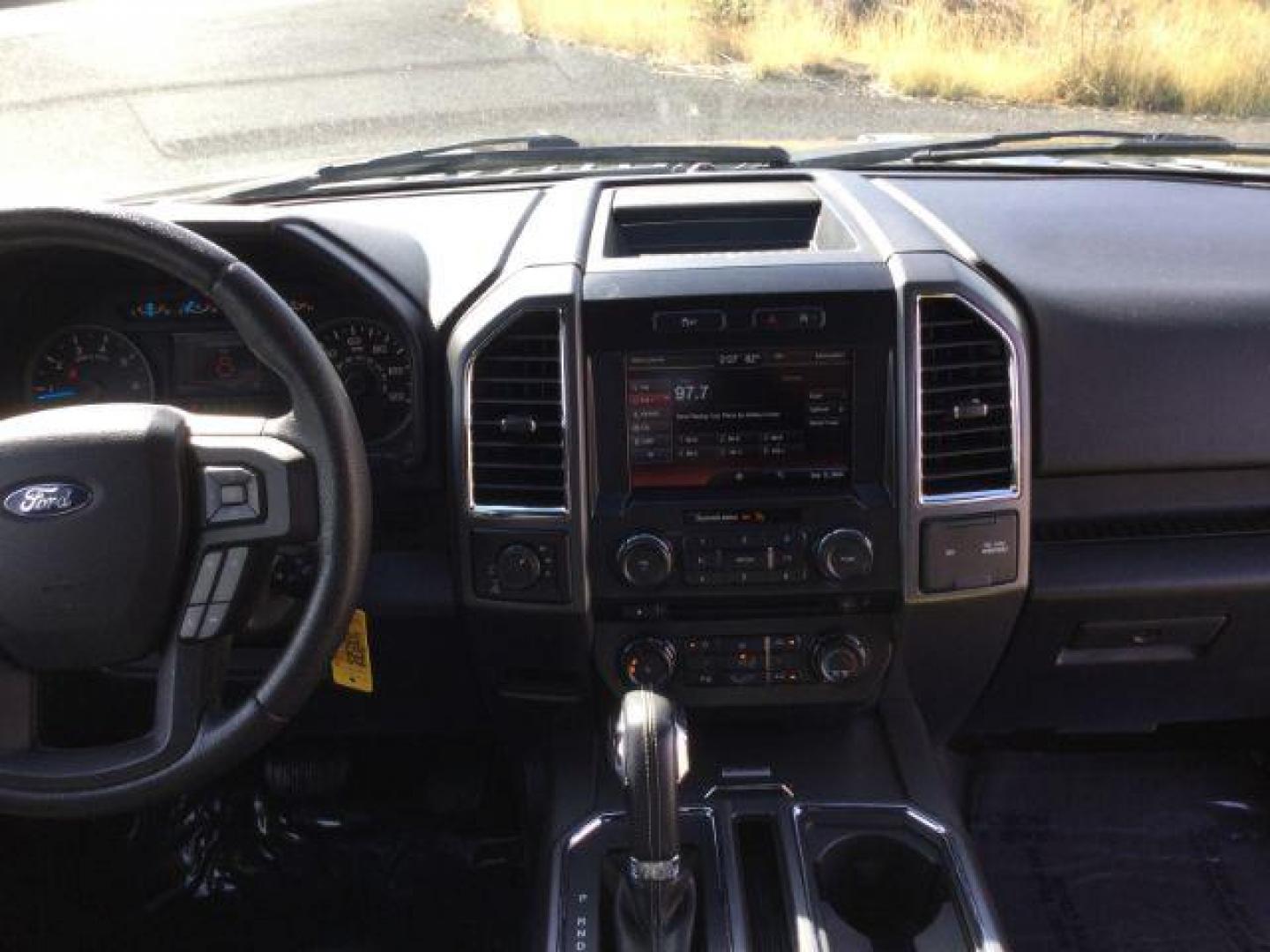 2015 Tuxedo Black Metallic /Dark charcoal cloth Ford F-150 XLT SuperCab 6.5-ft. Bed 4WD (1FTEX1EP9FF) with an 2.7L V6 DOHC 24V engine, 6-Speed Automatic transmission, located at 1801 Main Street, Lewiston, 83501, (208) 743-9371, 46.417065, -117.004799 - Photo#16