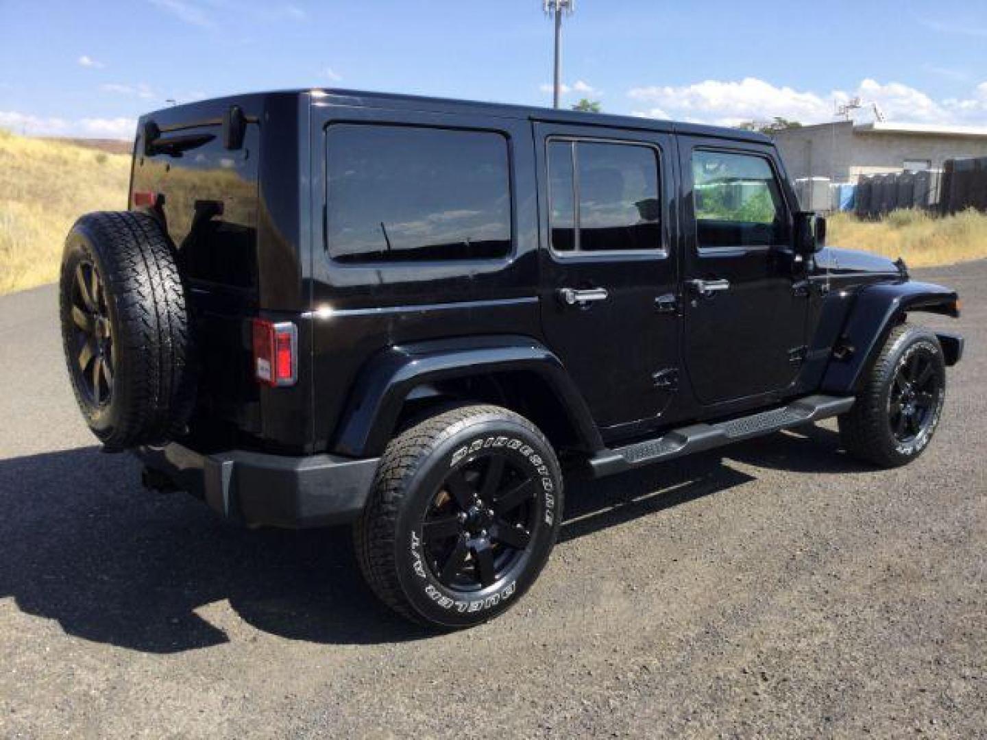 2014 Black Clearcoat /Black Jeep Wrangler Unlimited Sahara 4WD (1C4BJWEG7EL) with an 3.6L V6 DOHC 24V FFV engine, 5-Speed Automatic transmission, located at 1801 Main Street, Lewiston, 83501, (208) 743-9371, 46.417065, -117.004799 - Photo#15