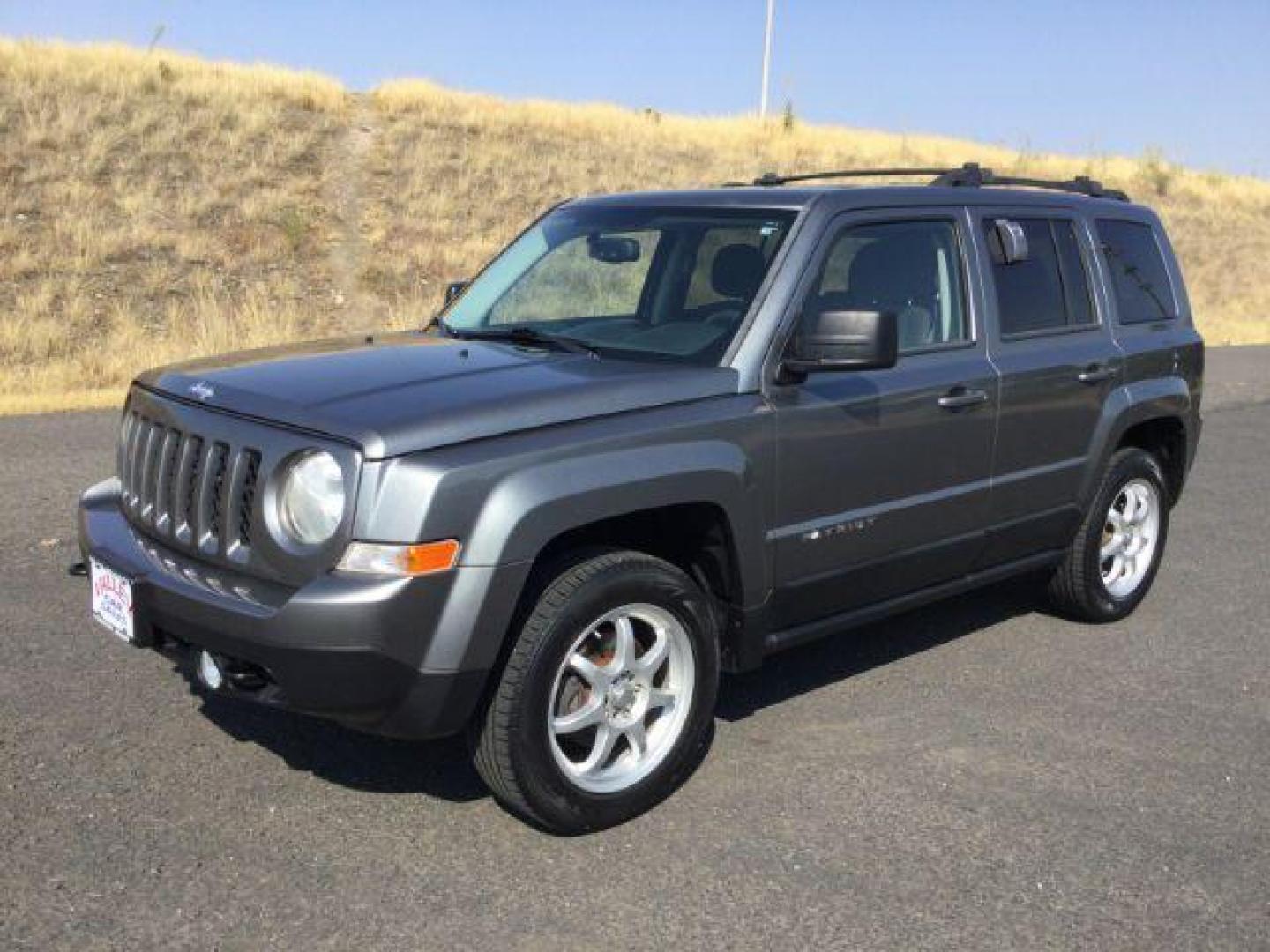 2011 Mineral Gray Metallic /Dark Slate Gray Cloth Interior Jeep Patriot 4WD (1J4NF1GB8BD) with an 2.4L L4 DOHC 16V engine, Continuously Variable Transmission transmission, located at 1801 Main Street, Lewiston, 83501, (208) 743-9371, 46.417065, -117.004799 - Photo#0