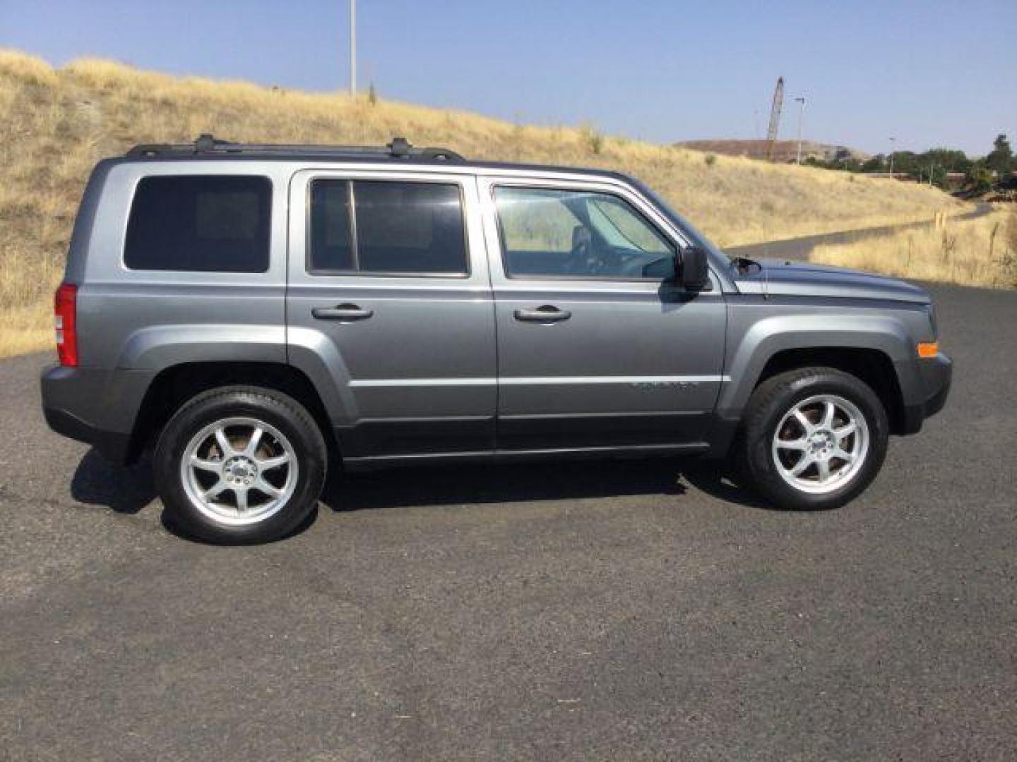 2011 Mineral Gray Metallic /Dark Slate Gray Cloth Interior Jeep Patriot 4WD (1J4NF1GB8BD) with an 2.4L L4 DOHC 16V engine, Continuously Variable Transmission transmission, located at 1801 Main Street, Lewiston, 83501, (208) 743-9371, 46.417065, -117.004799 - Photo#11