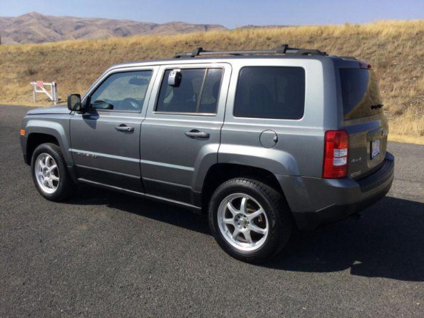 2011 Mineral Gray Metallic /Dark Slate Gray Cloth Interior Jeep Patriot 4WD (1J4NF1GB8BD) with an 2.4L L4 DOHC 16V engine, Continuously Variable Transmission transmission, located at 1801 Main Street, Lewiston, 83501, (208) 743-9371, 46.417065, -117.004799 - Photo#2