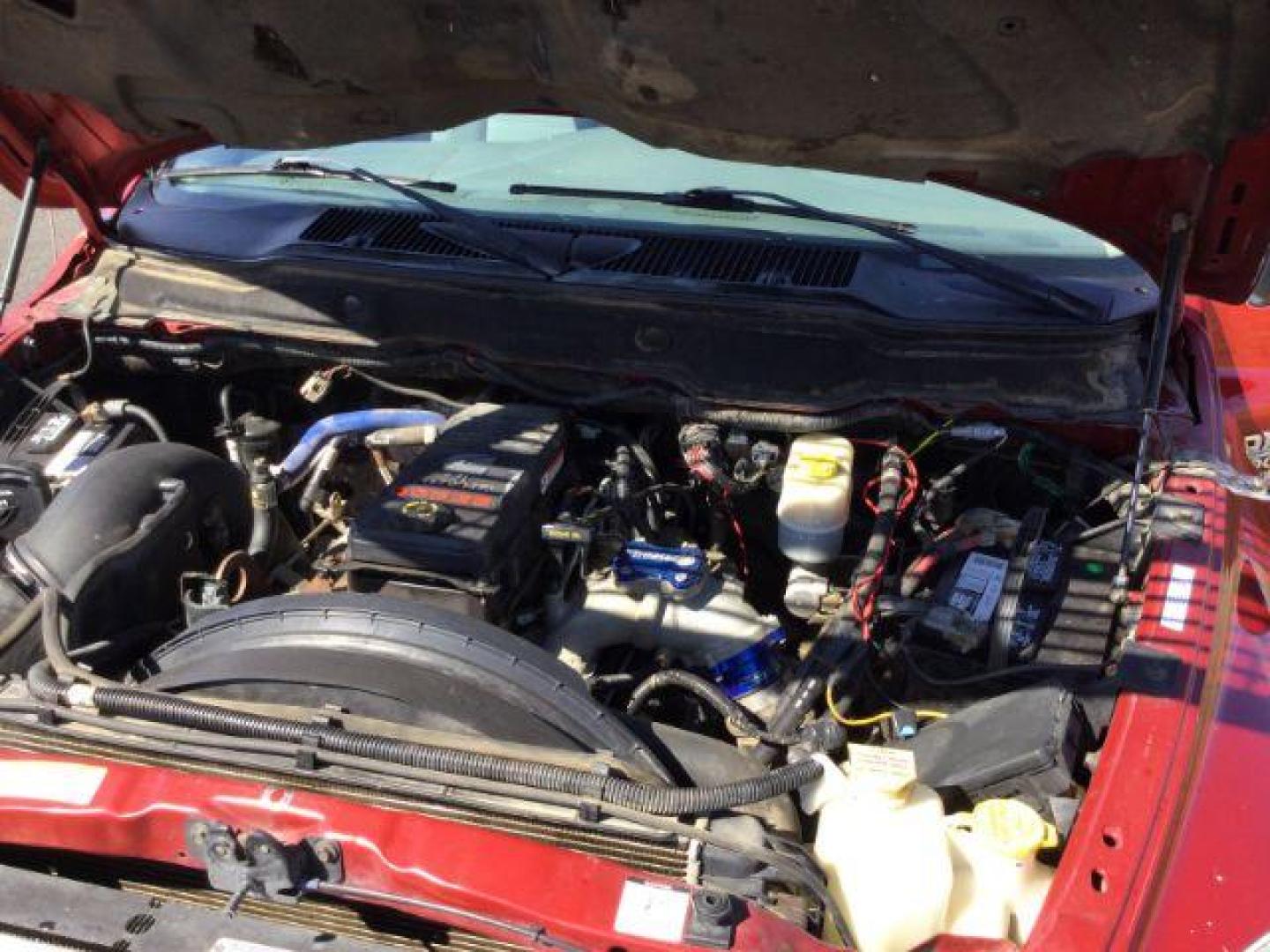 2007 Inferno Red Crystal Pearl Coat /Medium Slate Gray Cloth Interior Dodge Ram 2500 SLT Quad Cab 4WD (3D7KS28A37G) with an 6.7L L6 OHV 24V TURBO DIESEL engine, 6-Speed Manual transmission, located at 1801 Main Street, Lewiston, 83501, (208) 743-9371, 46.417065, -117.004799 - Photo#17