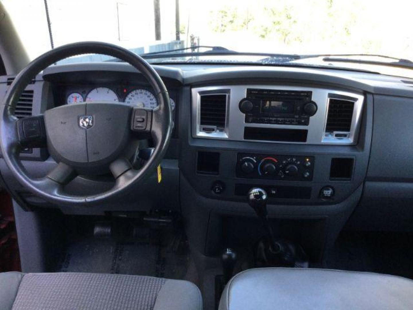 2007 Inferno Red Crystal Pearl Coat /Medium Slate Gray Cloth Interior Dodge Ram 2500 SLT Quad Cab 4WD (3D7KS28A37G) with an 6.7L L6 OHV 24V TURBO DIESEL engine, 6-Speed Manual transmission, located at 1801 Main Street, Lewiston, 83501, (208) 743-9371, 46.417065, -117.004799 - Photo#7