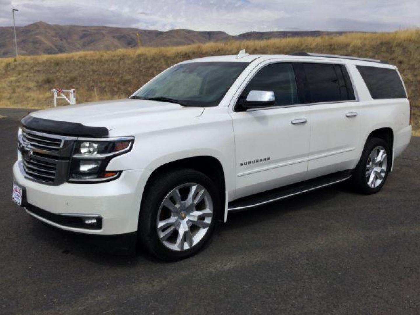 2017 Iridescent Pearl Tricoat /Cocoa/Mahogany, leather Chevrolet Suburban Premier 4WD (1GNSKJKC3HR) with an 5.3L V8 OHV 16V engine, 6-Speed Automatic transmission, located at 1801 Main Street, Lewiston, 83501, (208) 743-9371, 46.417065, -117.004799 - Photo#0