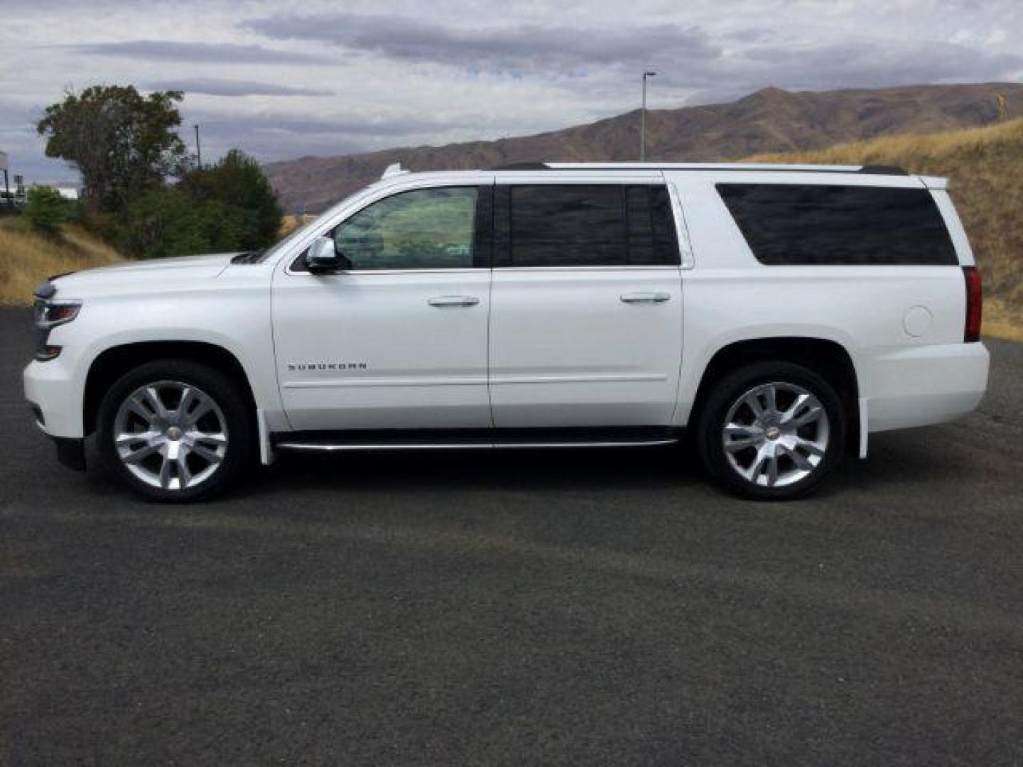 2017 Iridescent Pearl Tricoat /Cocoa/Mahogany, leather Chevrolet Suburban Premier 4WD (1GNSKJKC3HR) with an 5.3L V8 OHV 16V engine, 6-Speed Automatic transmission, located at 1801 Main Street, Lewiston, 83501, (208) 743-9371, 46.417065, -117.004799 - Photo#1