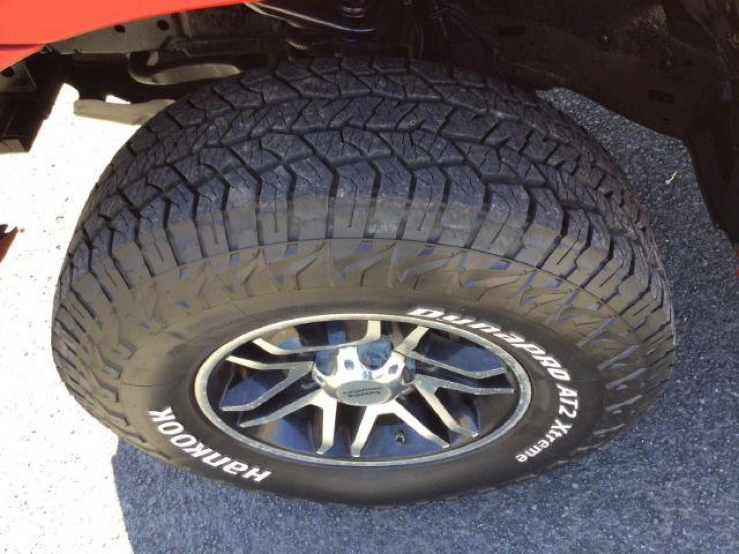 2006 Radiant Red /Graphite Cloth Interior Toyota Tacoma Double Cab V6 4WD (5TELU42N76Z) with an 4.0L V6 DOHC 24V engine, automatic transmission, located at 1801 Main Street, Lewiston, 83501, (208) 743-9371, 46.417065, -117.004799 - Photo#13