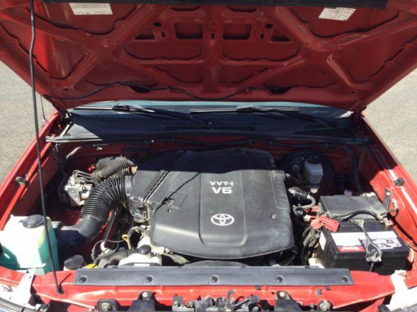 2006 Radiant Red /Graphite Cloth Interior Toyota Tacoma Double Cab V6 4WD (5TELU42N76Z) with an 4.0L V6 DOHC 24V engine, automatic transmission, located at 1801 Main Street, Lewiston, 83501, (208) 743-9371, 46.417065, -117.004799 - Photo#8