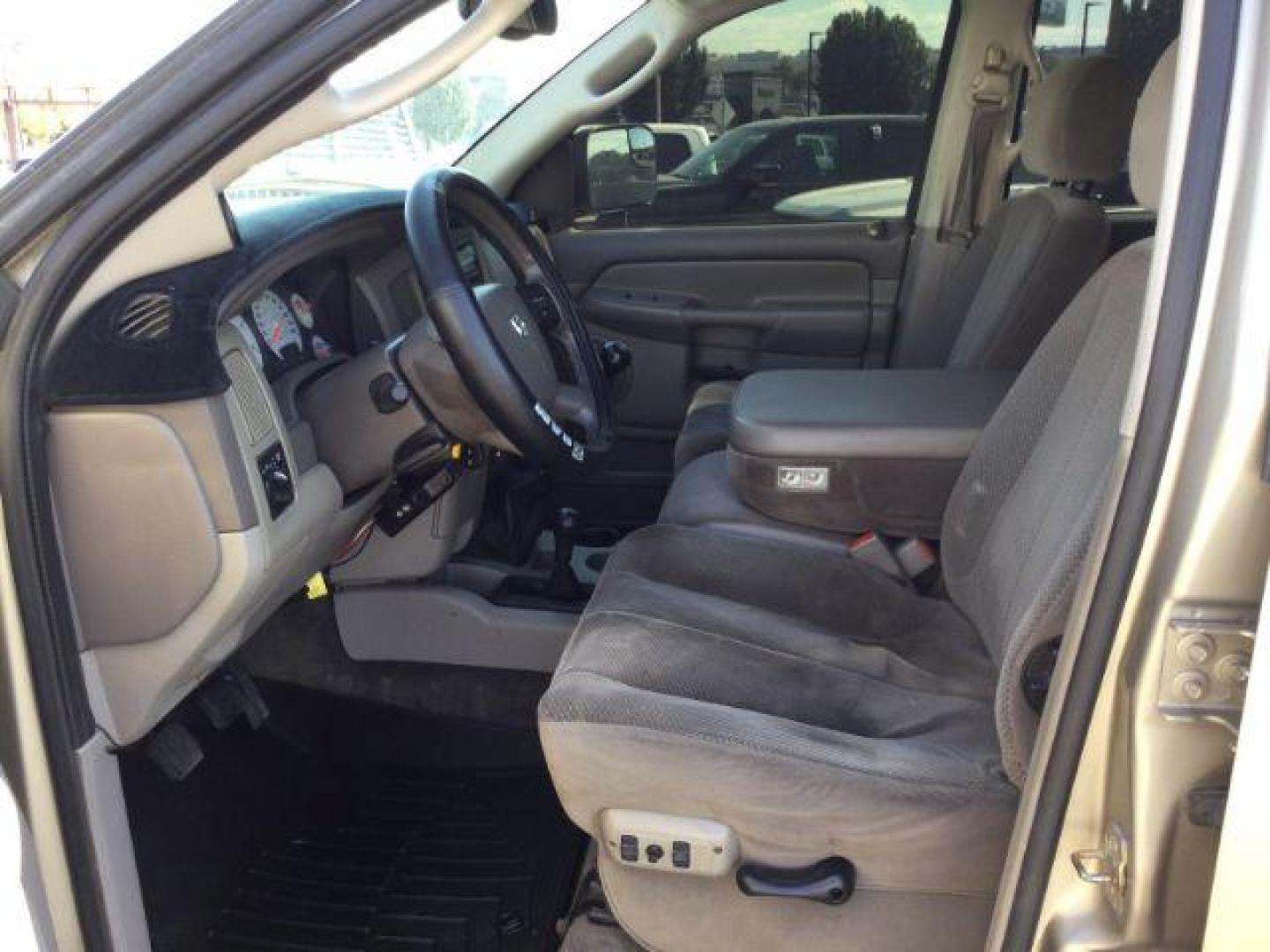 2005 Light Almond Pearl Metallic /Taupe Cloth Interior Dodge Ram 3500 SLT Quad Cab Long Bed 4WD (3D7LS38C25G) with an 5.9L L6 OHV 24V TURBO DIESEL engine, 6-Speed Manual transmission, located at 1801 Main Street, Lewiston, 83501, (208) 743-9371, 46.417065, -117.004799 - Photo#14