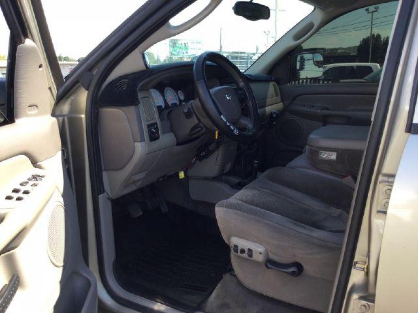 2005 Light Almond Pearl Metallic /Taupe Cloth Interior Dodge Ram 3500 SLT Quad Cab Long Bed 4WD (3D7LS38C25G) with an 5.9L L6 OHV 24V TURBO DIESEL engine, 6-Speed Manual transmission, located at 1801 Main Street, Lewiston, 83501, (208) 743-9371, 46.417065, -117.004799 - Photo#3