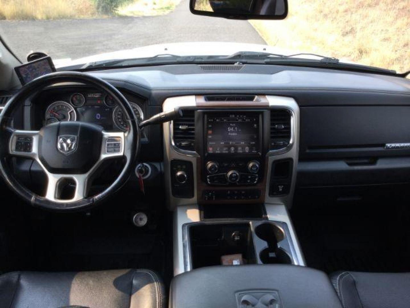 2014 WHITE /black leather RAM 3500 Crew Cab 4WD DRW (3C7WRTCLXEG) with an 6.7L L6 OHV 24V TURBO DIESEL engine, 6-Speed Automatic transmission, located at 1801 Main Street, Lewiston, 83501, (208) 743-9371, 46.417065, -117.004799 - Photo#16