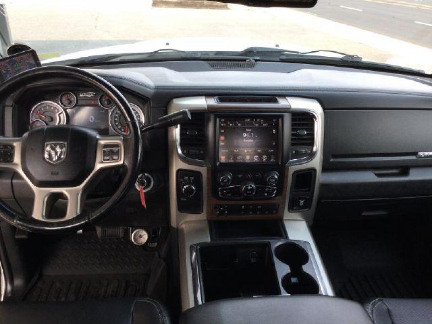 2014 WHITE /black leather RAM 3500 Crew Cab 4WD DRW (3C7WRTCLXEG) with an 6.7L L6 OHV 24V TURBO DIESEL engine, 6-Speed Automatic transmission, located at 1801 Main Street, Lewiston, 83501, (208) 743-9371, 46.417065, -117.004799 - Photo#27