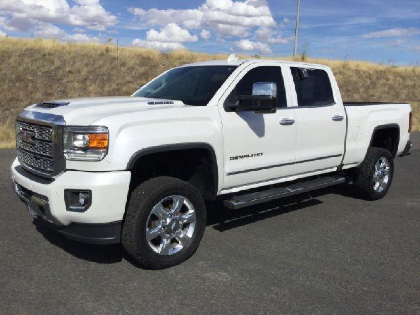 2018 White Frost Tricoat /Jet Black, leather GMC Sierra 3500HD Denali Crew Cab 4WD (1GT42YEY2JF) with an 6.6L V8 OHV 16 DIESEL engine, 6-Speed Automatic transmission, located at 1801 Main Street, Lewiston, 83501, (208) 743-9371, 46.417065, -117.004799 - Photo#0