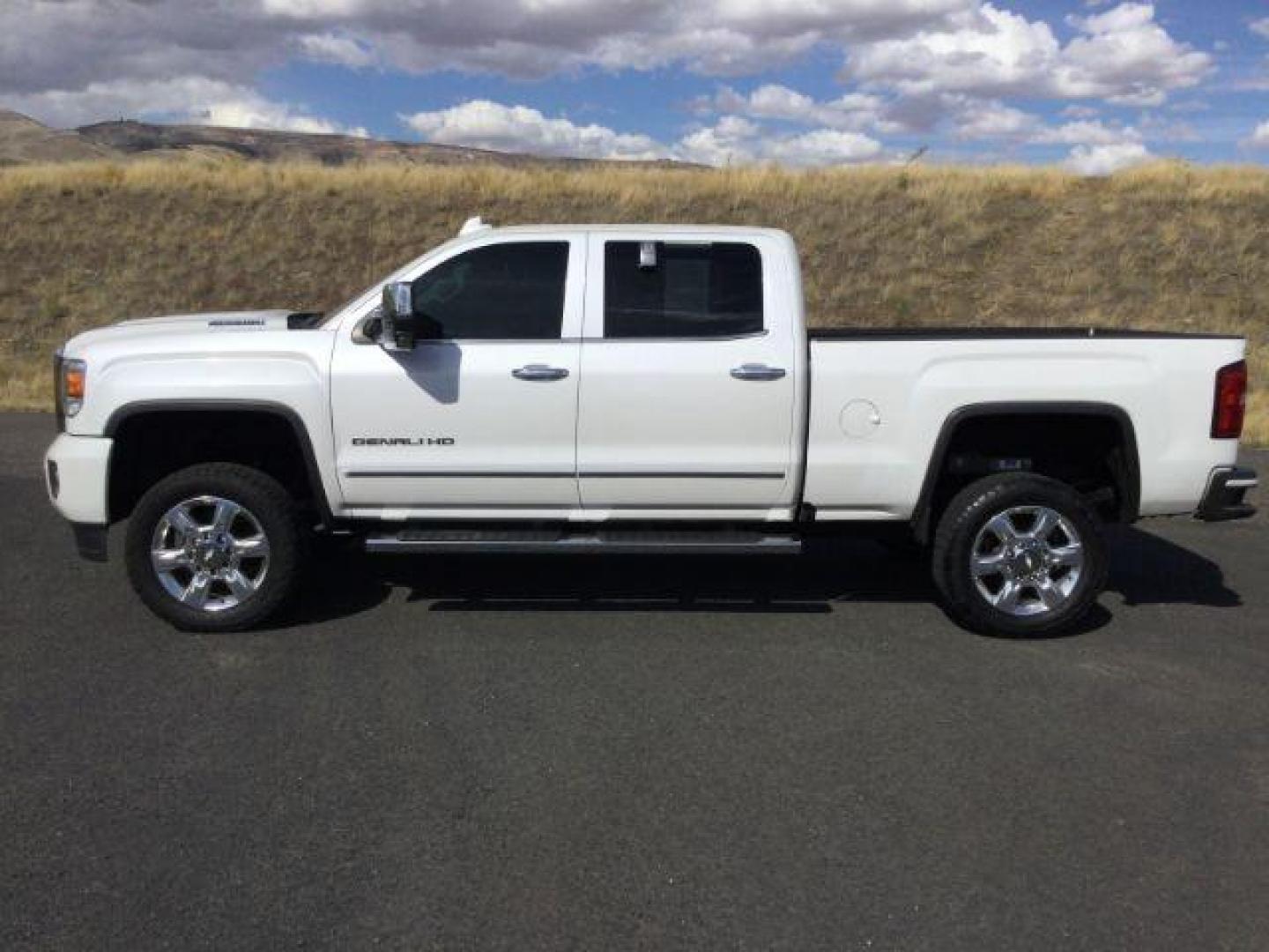 2018 White Frost Tricoat /Jet Black, leather GMC Sierra 3500HD Denali Crew Cab 4WD (1GT42YEY2JF) with an 6.6L V8 OHV 16 DIESEL engine, 6-Speed Automatic transmission, located at 1801 Main Street, Lewiston, 83501, (208) 743-9371, 46.417065, -117.004799 - Photo#1