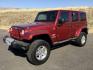 2011 Deep Cherry Red Crystal Pearl /Black Cloth Interior Jeep Wrangler Unlimited Sahara 4WD (1J4BA5H18BL) with an 3.8L V6 OHV 12V engine, 4-Speed Automatic transmission, located at 1801 Main Street, Lewiston, 83501, (208) 743-9371, 46.417065, -117.004799 - Photo#0