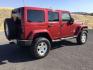 2011 Deep Cherry Red Crystal Pearl /Black Cloth Interior Jeep Wrangler Unlimited Sahara 4WD (1J4BA5H18BL) with an 3.8L V6 OHV 12V engine, 4-Speed Automatic transmission, located at 1801 Main Street, Lewiston, 83501, (208) 743-9371, 46.417065, -117.004799 - Photo#7