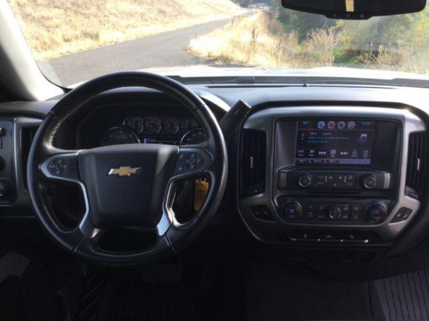 2018 Silver Ice Metallic /Jet Black, cloth Chevrolet Silverado 1500 LT Crew Cab Long Box 4WD (1GCUKREC4JF) with an 5.3L V8 OHV 16V engine, 6-Speed Automatic transmission, located at 1801 Main Street, Lewiston, 83501, (208) 743-9371, 46.417065, -117.004799 - Photo#20