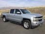 2018 Silver Ice Metallic /Jet Black, cloth Chevrolet Silverado 1500 LT Crew Cab Long Box 4WD (1GCUKREC4JF) with an 5.3L V8 OHV 16V engine, 6-Speed Automatic transmission, located at 1801 Main Street, Lewiston, 83501, (208) 743-9371, 46.417065, -117.004799 - Photo#6