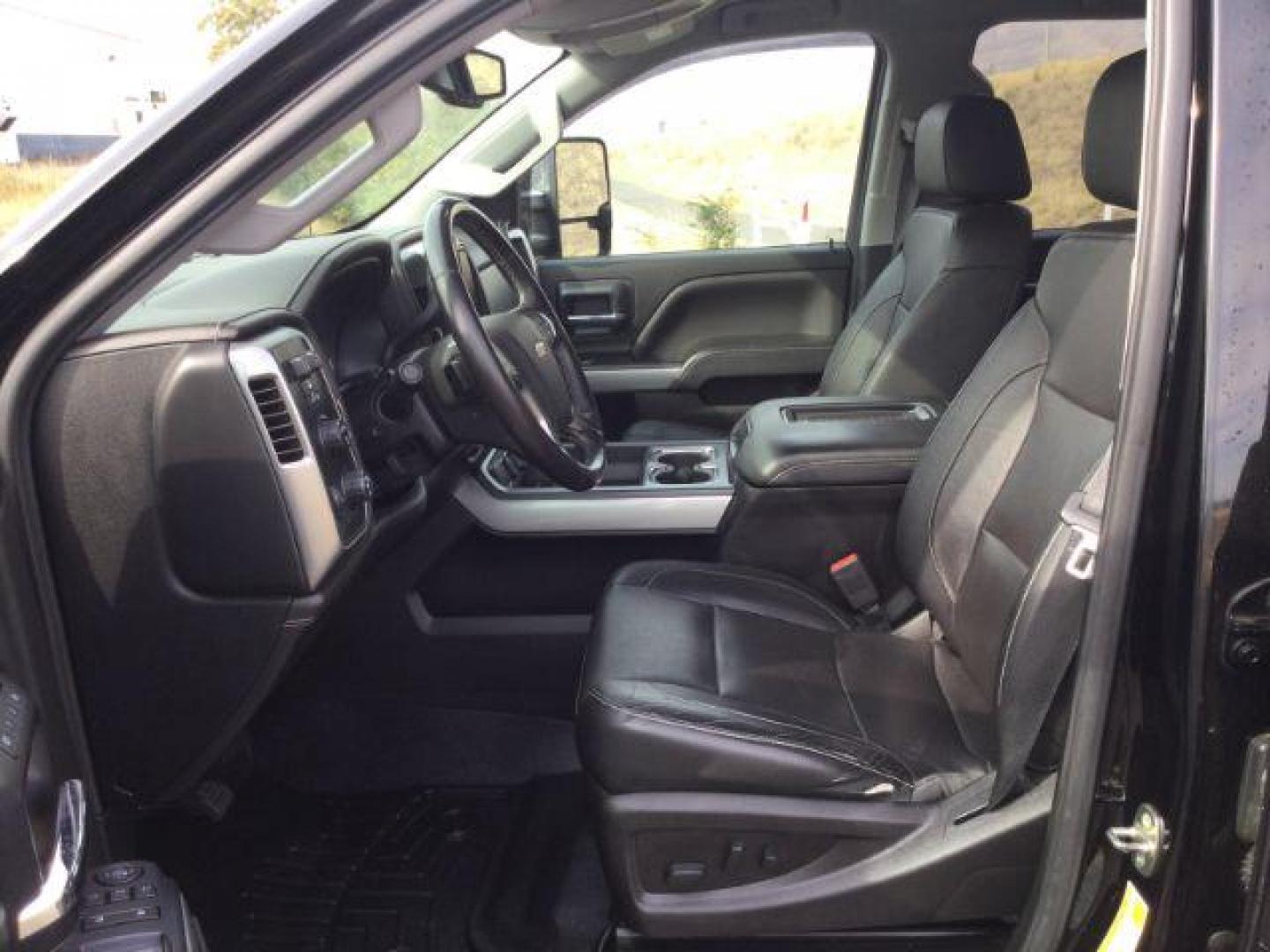 2018 Black /Jet Black, leather Chevrolet Silverado 2500HD LTZ Crew Cab 4WD (1GC1KWEG9JF) with an 6.0L V8 OHV 16V FFV engine, 6-Speed Automatic transmission, located at 1801 Main Street, Lewiston, 83501, (208) 743-9371, 46.417065, -117.004799 - Photo#4