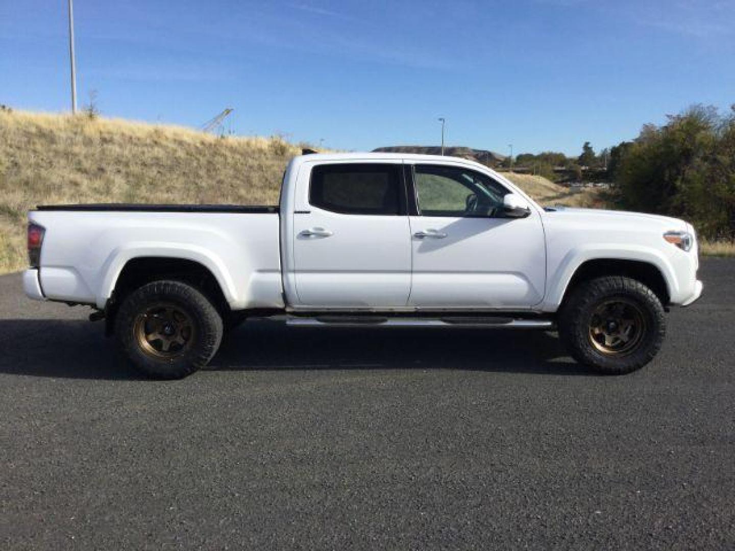 2016 Super White /Hickory, leather Toyota Tacoma Limited Double Cab Super Long Bed V6 5AT 4WD (5TFHZ5BN2GX) with an 3.5L V6 DOHC 24V engine, 6-Speed Automatic transmission, located at 1801 Main Street, Lewiston, 83501, (208) 743-9371, 46.417065, -117.004799 - Photo#10