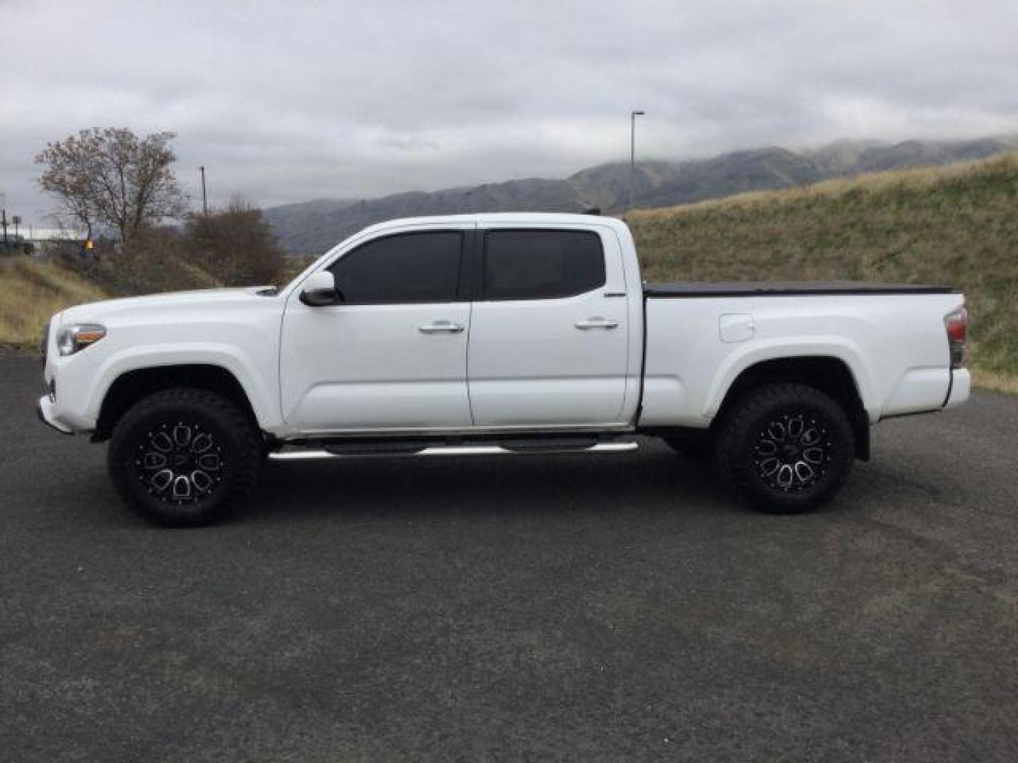 2016 Super White /Hickory, leather Toyota Tacoma Limited Double Cab Super Long Bed V6 5AT 4WD (5TFHZ5BN2GX) with an 3.5L V6 DOHC 24V engine, 6-Speed Automatic transmission, located at 1801 Main Street, Lewiston, 83501, (208) 743-9371, 46.417065, -117.004799 - Photo#1