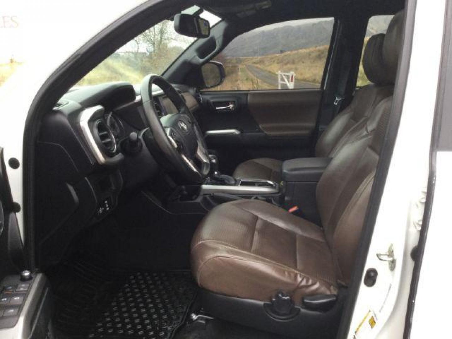 2016 Super White /Hickory, leather Toyota Tacoma Limited Double Cab Super Long Bed V6 5AT 4WD (5TFHZ5BN2GX) with an 3.5L V6 DOHC 24V engine, 6-Speed Automatic transmission, located at 1801 Main Street, Lewiston, 83501, (208) 743-9371, 46.417065, -117.004799 - Photo#4