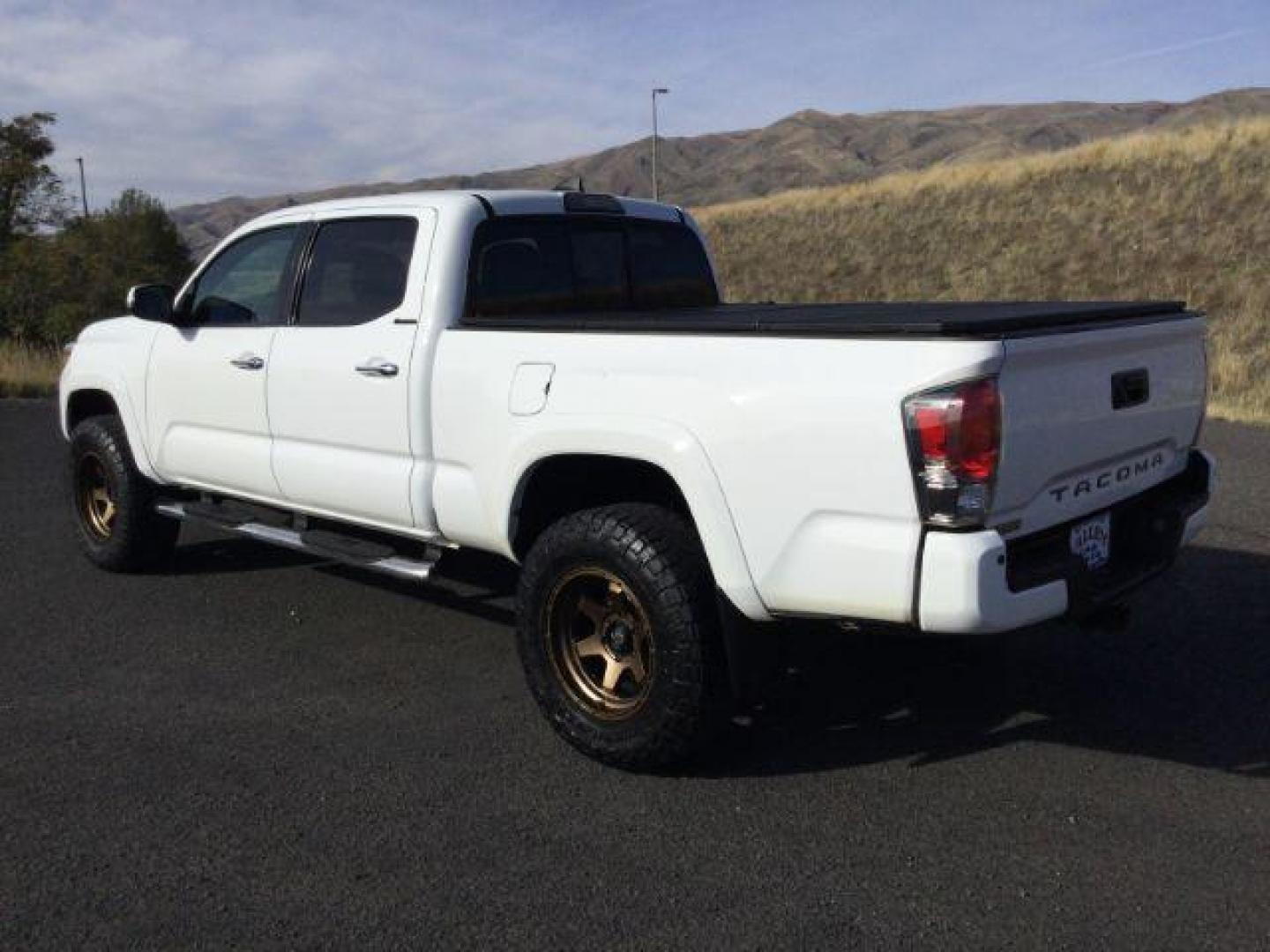 2016 Super White /Hickory, leather Toyota Tacoma Limited Double Cab Super Long Bed V6 5AT 4WD (5TFHZ5BN2GX) with an 3.5L V6 DOHC 24V engine, 6-Speed Automatic transmission, located at 1801 Main Street, Lewiston, 83501, (208) 743-9371, 46.417065, -117.004799 - Photo#2