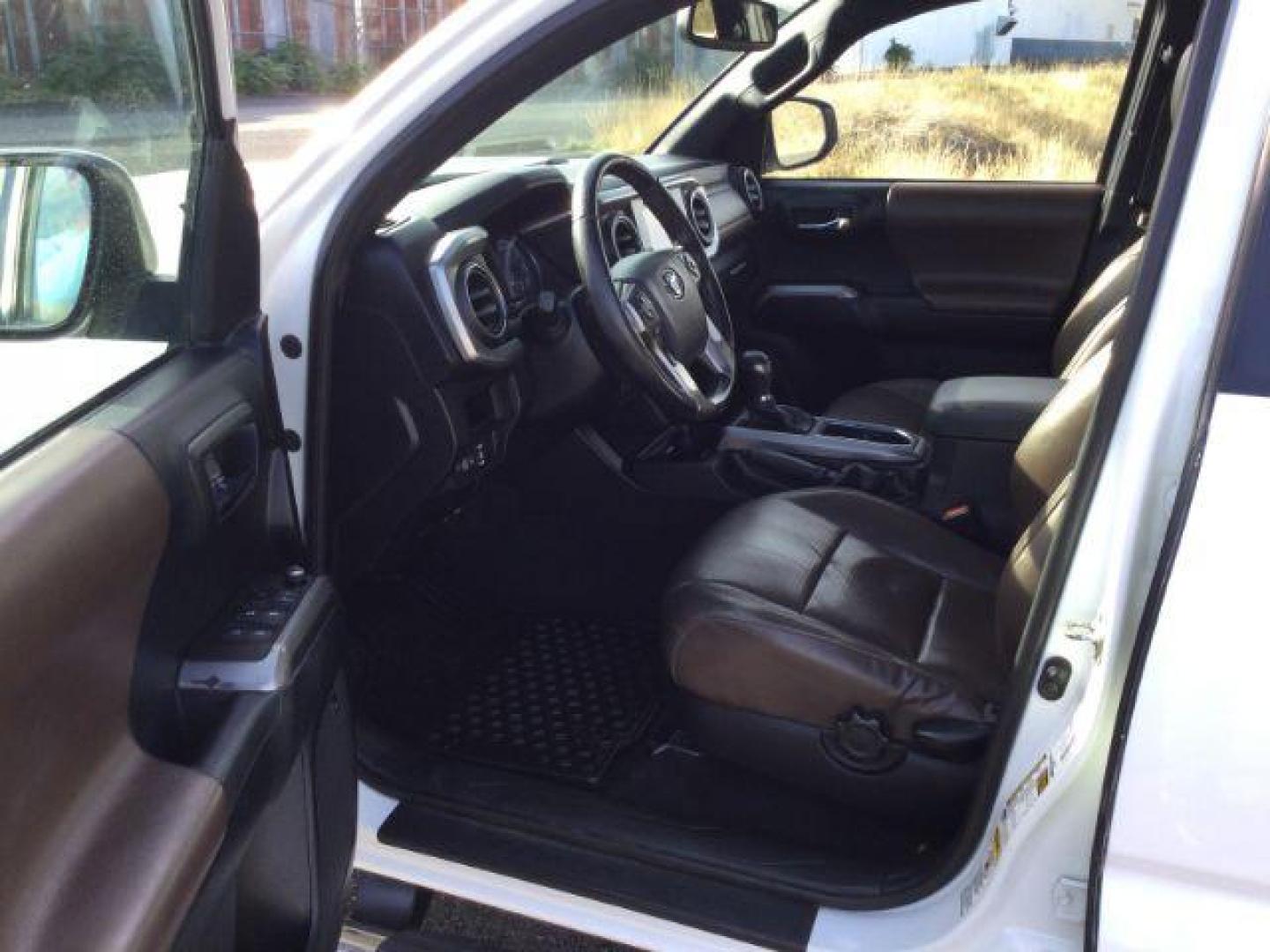 2016 Super White /Hickory, leather Toyota Tacoma Limited Double Cab Super Long Bed V6 5AT 4WD (5TFHZ5BN2GX) with an 3.5L V6 DOHC 24V engine, 6-Speed Automatic transmission, located at 1801 Main Street, Lewiston, 83501, (208) 743-9371, 46.417065, -117.004799 - Photo#4