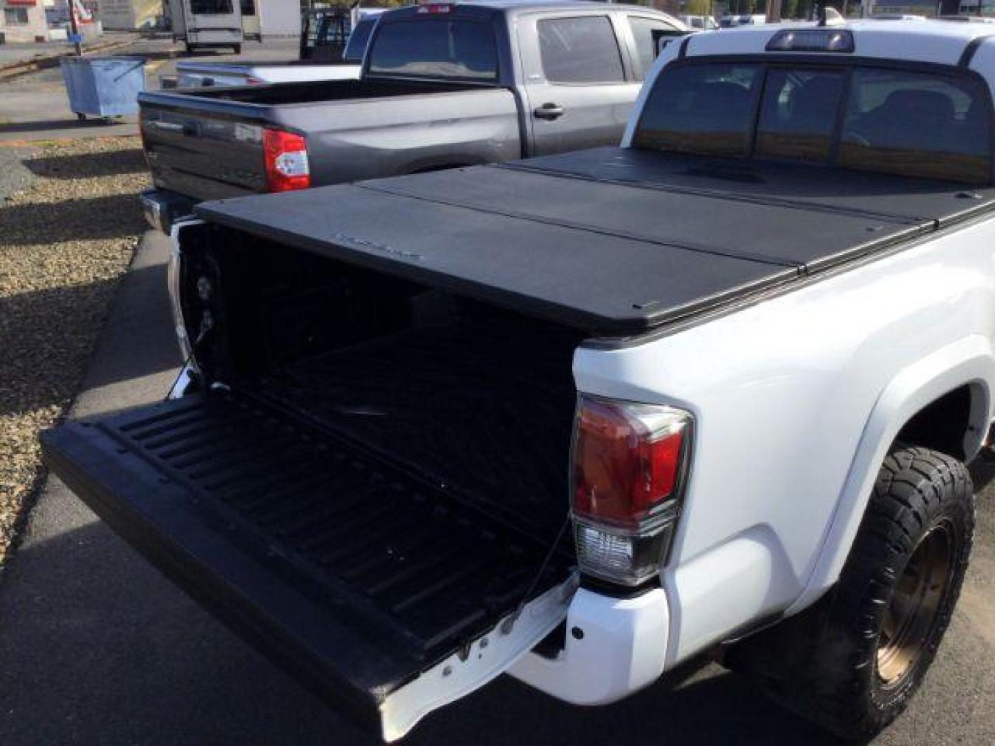 2016 Super White /Hickory, leather Toyota Tacoma Limited Double Cab Super Long Bed V6 5AT 4WD (5TFHZ5BN2GX) with an 3.5L V6 DOHC 24V engine, 6-Speed Automatic transmission, located at 1801 Main Street, Lewiston, 83501, (208) 743-9371, 46.417065, -117.004799 - Photo#7