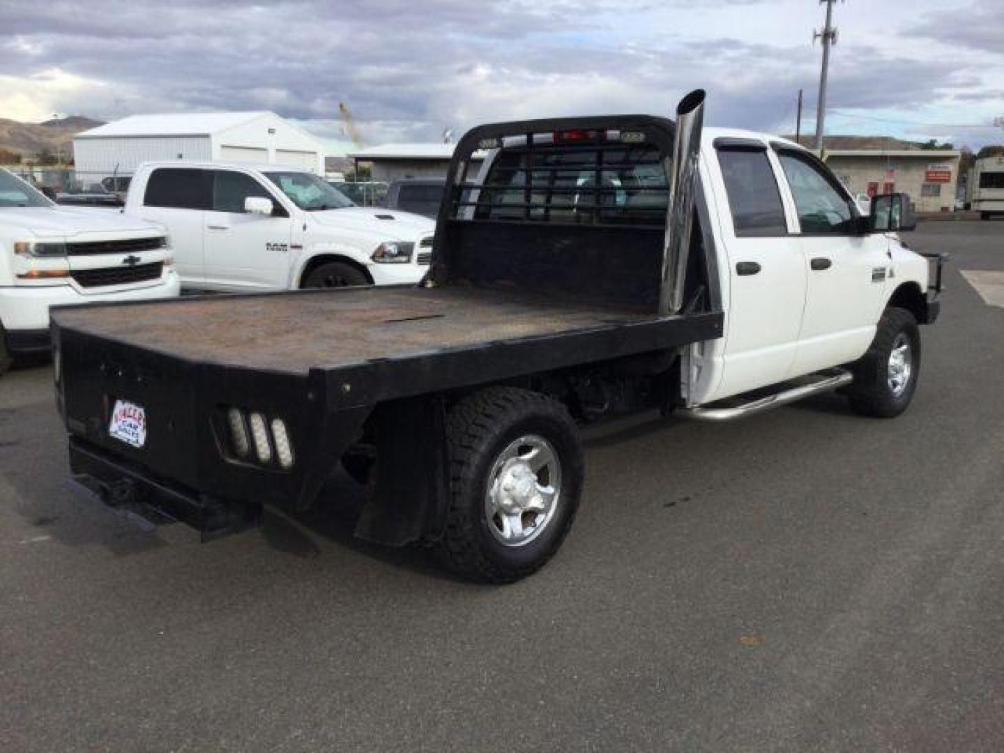 2007 Bright White /Medium Slate Gray Cloth Interior Dodge Ram 2500 SLT Quad Cab LWB 4WD (3D7KS28C37G) with an 5.9L L6 OHV 24V TURBO DIESEL engine, 6-Speed Manual transmission, located at 1801 Main Street, Lewiston, 83501, (208) 743-9371, 46.417065, -117.004799 - Photo#11