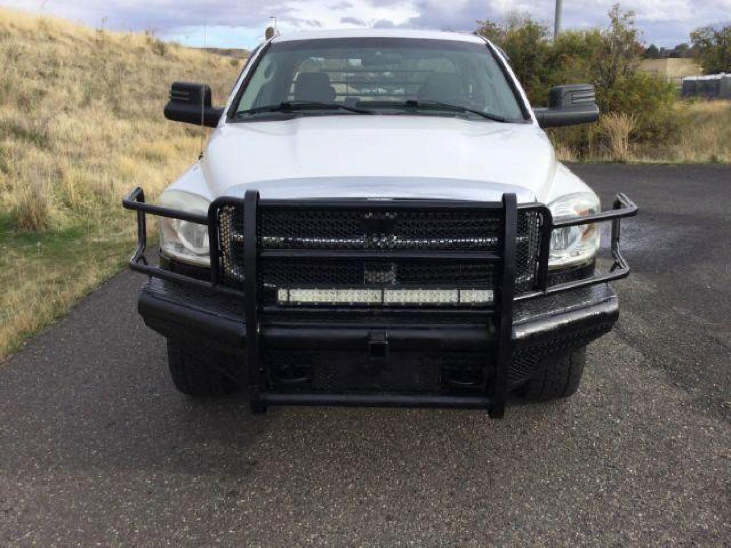 2007 Bright White /Medium Slate Gray Cloth Interior Dodge Ram 2500 SLT Quad Cab LWB 4WD (3D7KS28C37G) with an 5.9L L6 OHV 24V TURBO DIESEL engine, 6-Speed Manual transmission, located at 1801 Main Street, Lewiston, 83501, (208) 743-9371, 46.417065, -117.004799 - Photo#16