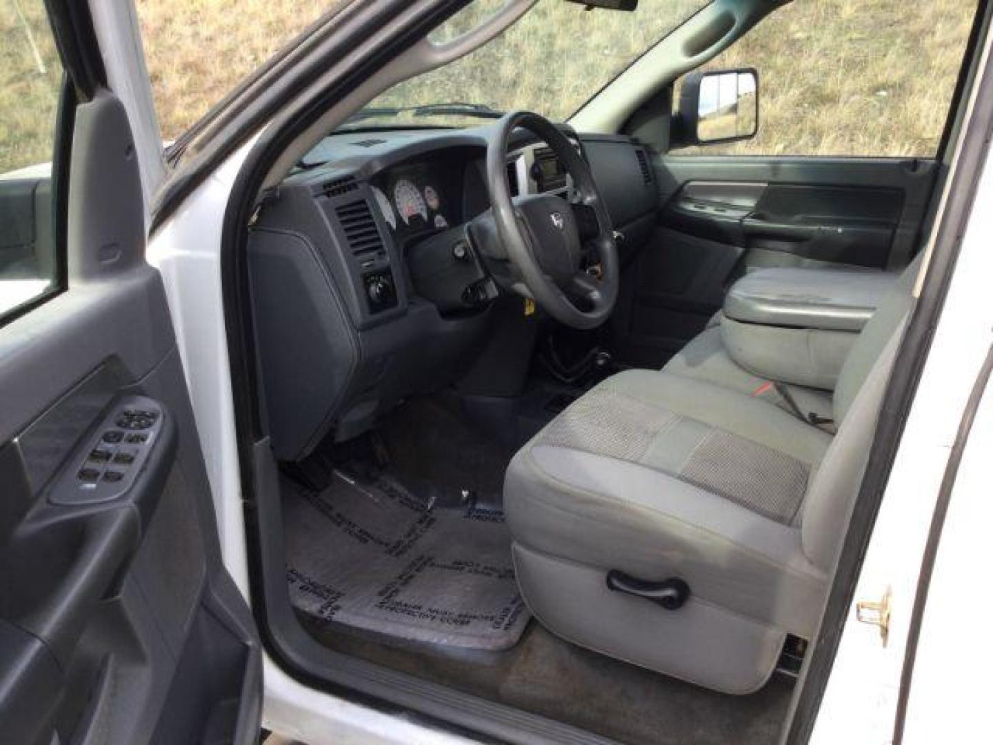 2007 Bright White /Medium Slate Gray Cloth Interior Dodge Ram 2500 SLT Quad Cab LWB 4WD (3D7KS28C37G) with an 5.9L L6 OHV 24V TURBO DIESEL engine, 6-Speed Manual transmission, located at 1801 Main Street, Lewiston, 83501, (208) 743-9371, 46.417065, -117.004799 - Photo#3